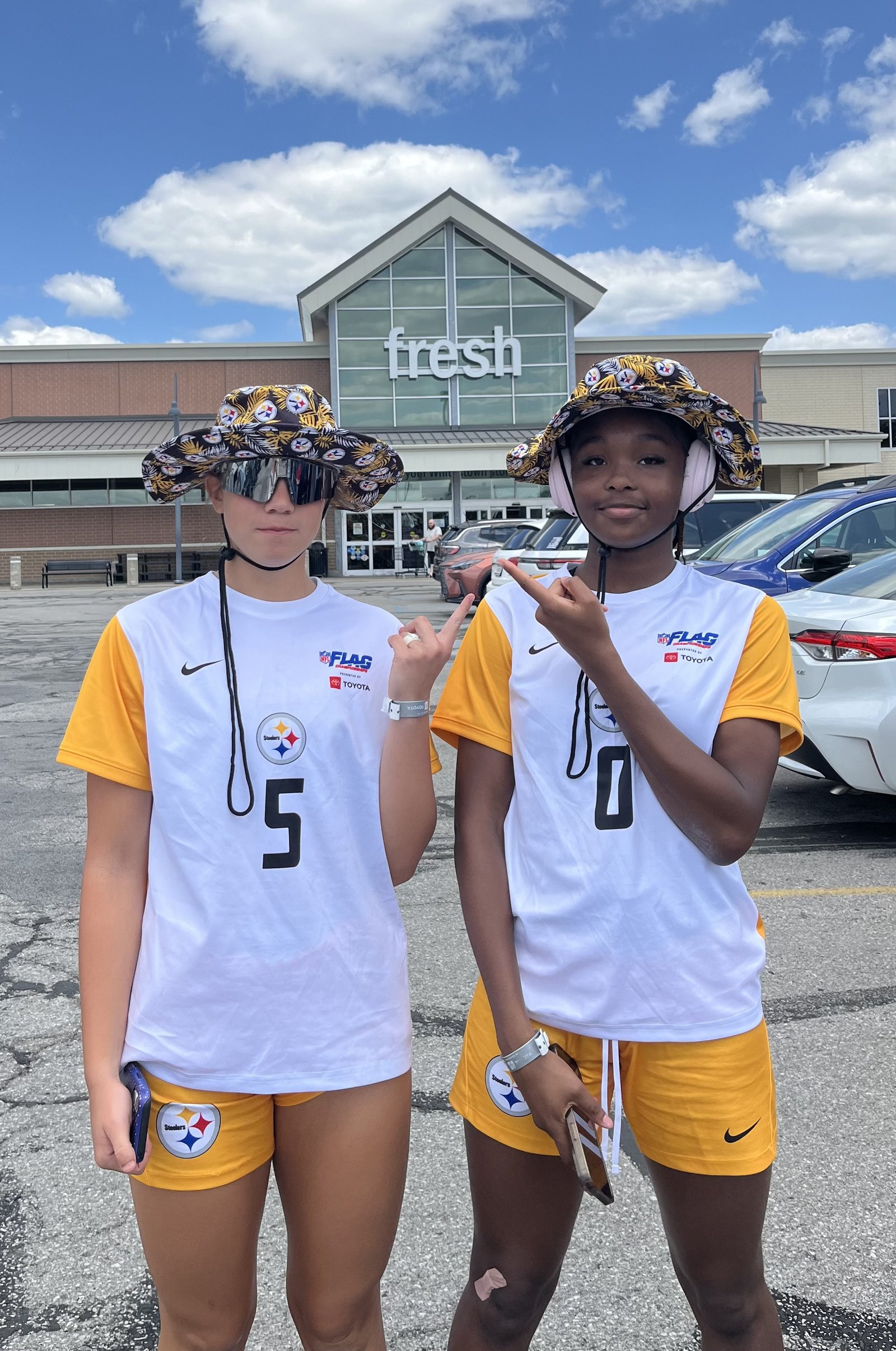 Players #5 and #0 in Steelers gear